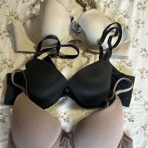 3 Victoria’s Secret bras - Black, light brown, and Tan- 36B